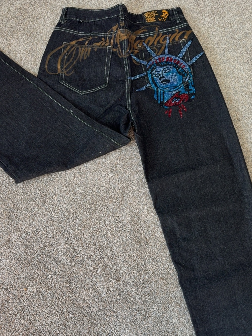 CHRISTIAN AUDIGIER STATUE OF LIBERTY JEANS